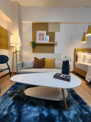 a living room with a coffee table and a couch at new room near Don Mueang airport,Impact,BTS 339 in Ban Song Hong