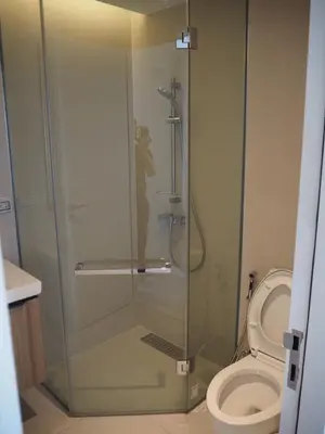 a shower stall in a bathroom with a toilet at Circle Sukhumvit31 Bangkok #2BR #5ppl in Bangkok