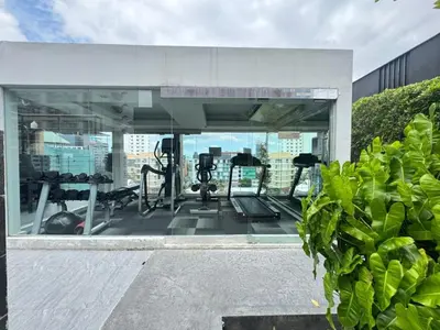 a gym on the roof of a building at Central Living Ploenchit in Bang Kapi