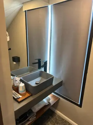 a bathroom with a sink and a shower at Thai Loft \u6cf0\u95a3 in Bangkok