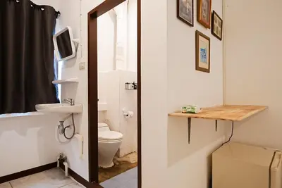 a bathroom with a toilet and a sink at xx GO INN Asiatique BKK - โกอินน์ เอเชียทีค เจริญกรุง in Godown
