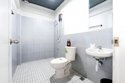 a bathroom with a toilet and a sink at xx Yellow Place Sukhumvit Soi 2 BTS Nana - เยลโล เพลส สุขุมวิท ซอย 2 บีทีเอส นานา in Bang Kapi