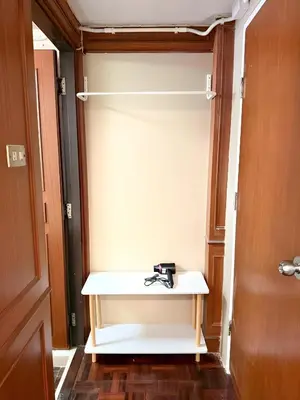 a closet with a white table in a room at xx Stay On Sukhumvit Soi 11 สเตย์ออน สุขุมวิท 11 in Makkasan