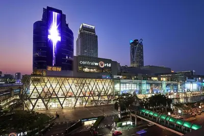 a city skyline with tall buildings at night at XX GO INN Silom BTS Surasak สถานีสุรศักดิ์ in Yan Nawa