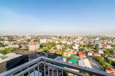 a view of the city from the balcony of a building at TC Contel At True Digital Park in Amphoe Phra Khanong