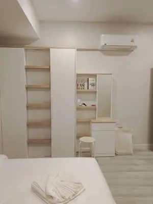 a room with a bed with a towel on it at Lovely Townhome in Shopping District near BTS&MRT in Bang Su
