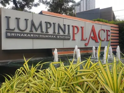 a sign for the entrance to a building with a fountain at Lummpni palace in Ban Bang Toei (1)