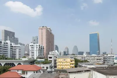 a view of a city with tall buildings at Cloud no 5 Generous space Green n Quiet Heart BKK in Bangkok