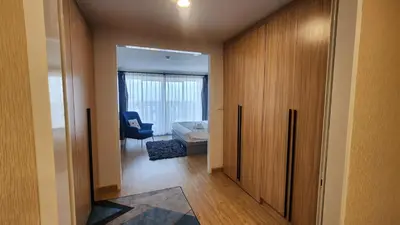 a room with a door leading to a bedroom at Floating Above Bangkok Same buiding of Lebua High Floor Dream near Iconsiam Asiatique in Bangkok