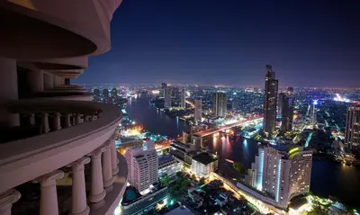 a view of a city at night from a building at Floating Above Bangkok Same buiding of Lebua High Floor Dream near Iconsiam Asiatique in Bangkok