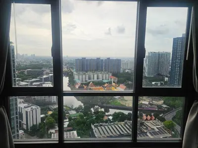 a view of a city from a window at 1 Bedroom Bangkok Skyline View Apartment At ON-NUT in Bangkok
