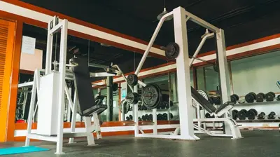 a gym with a bunch of treadmills and weights at Vibrant City Retreat 6 Mins Walk BTS Nana, 1BR in Bangkok