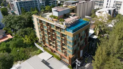 an overhead view of a building with plants on it at Alcove 53 in Bangkok
