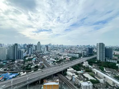 an overhead view of a city with a highway at Elegant 1BR Condo - Ultra Fast WiFi - BTS On-Nut in Bangkok