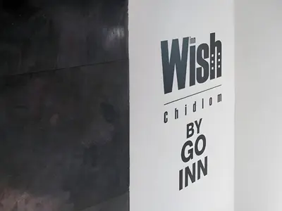 a sign with the wii logo on it at XX Wish Inn Chidlom V - วิชช์อินน์ ชิดลม in Pratunam