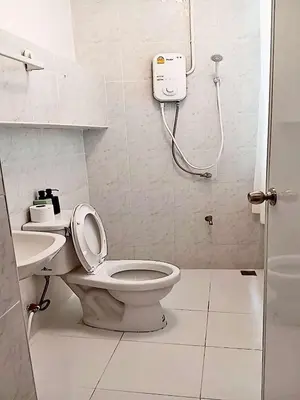 a bathroom with a toilet and a sink at xxThe Character Yaowarat Mrt Wat Mangkon Station - เดอะคาแรคเตอร์ เยาวราช สถานีวัดมังกร in Bangkok