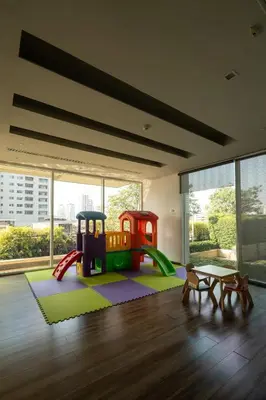 a living room with a play room with a playground at Ivy Thonglor Luxury Condo with Swimming Pool, Fast Wifi in Bangkok