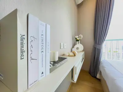 a room with a table with three boxes on it at CBD Living 2 BR ︱Prime Sukhumvit ︱Walk to BTS Asok & MRT SKV ︱UltraWi-Fi in Bangkok
