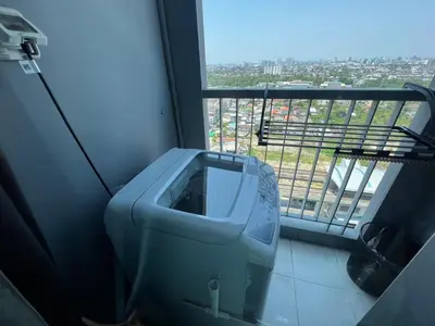 a bathroom with a urinal in front of a window at Cozy9Living in Bangkok 60mto MRT in Ban Bang Khwang