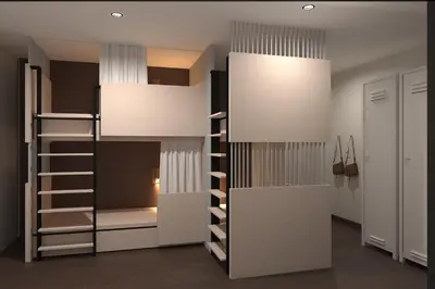 a room with a bunk bed with a ladder at Ranana Bangkok in Bangkok