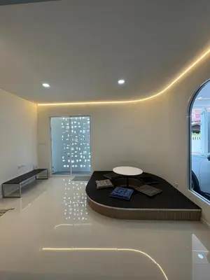 a room with a bed and a large window at BaanChan House and Studio at Ramkhamhaeng in Ban Bang Toei (1)