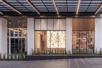 a rendering of the front of a building at 5 Star Centric 1BD Apartment Sukhumvit in Bangkok
