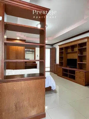 a bedroom with a bunk bed and a tv at Prestige in Bangna