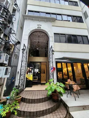 an entrance to a building with an archway at Be Cozy Silom Modern 2BR 1-min to BTS & MRT in Bangkok