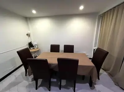 a dining room with a table and chairs at 4BR 12PAX 7min walk to Samitivej Sukhumvit Hospital in Khlong Toei