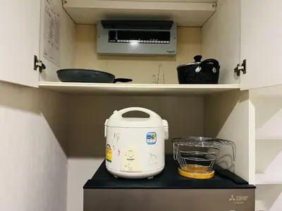 a kitchen with a toaster and a blender on a counter at Thong Lor Luxury condo with Swimming Pool, Fast Wifi in Sathani Khlong Tan