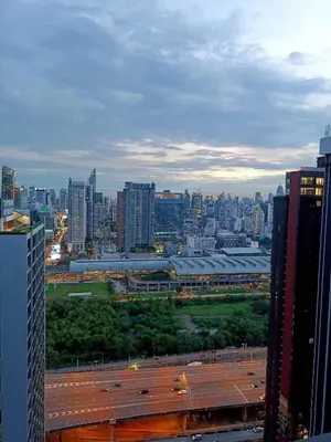 a view of a city with a highway and buildings at Life asoke rama 9 in Bangkok
