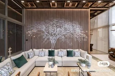 a living room with a white couch and a tree at Ekkamai \u65e5\u5f0f\u5962\u83ef\u79c1\u4eba\u516c\u5bd3 in Bangkok