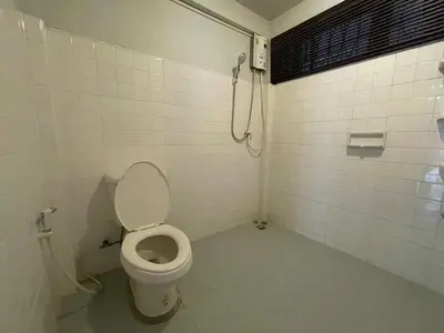 a bathroom with a toilet and a shower at 4BR House max 10pax, Near MRT and Local Place