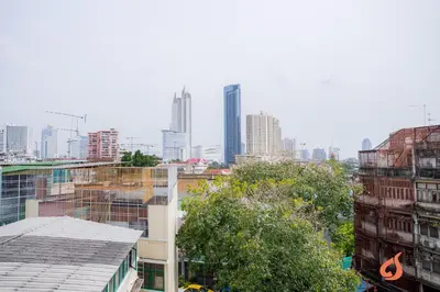 a view of a city with tall buildings at Pho Place in Bangkok