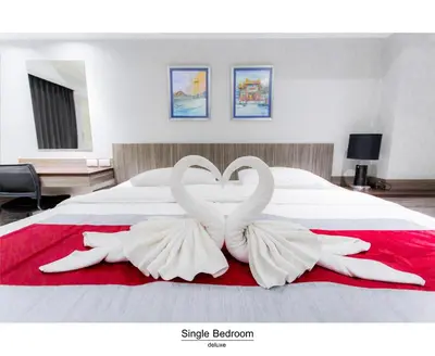 two swansrendered to look like hearts on a bed at Pho Place in Bangkok