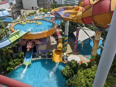 an aerial view of a water park at a theme park at River View Bangkok Apartment in Bangkok