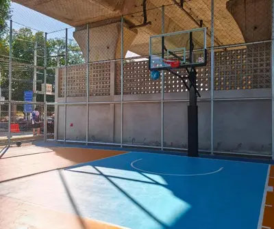 a basketball hoop on a basketball court at Amina Residence in Ban Sai Ma