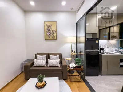 a living room with a couch and a table at \u66b9\u7f57\u767e\u4e3d\u5bab\u5962\u534e\u516c\u5bd3 Siam Paragon Luxury Stay #W08 in Pratunam