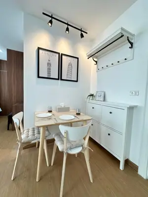 a dining room with a table and chairs at 6th Avenue Sukhumvit BKK 403 BTS Asoke Nana MRT Sukhumvit in Bangkok