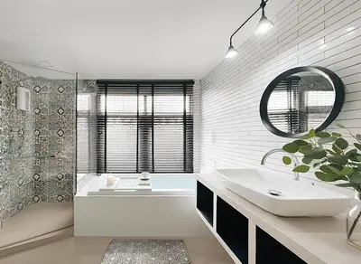 a bathroom with a white tub and a sink and a bath tub at Urban Charm & Unique at KIT-TI's Art Home Sukhumvit in Bangkok