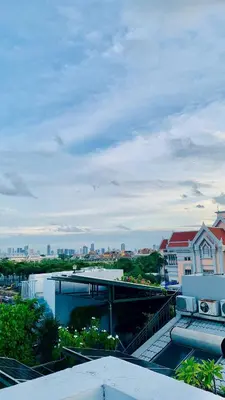 a view of a city from the roof of a building at Loft Rattanakosin Mansion in Bangkok