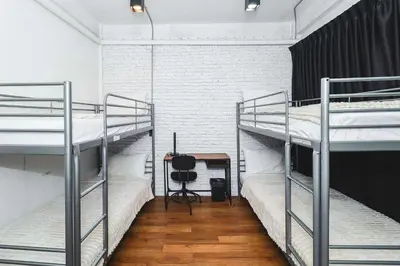 a room with three bunk beds and a desk at Rose Loft Family or friends 6 person in Thonhuri