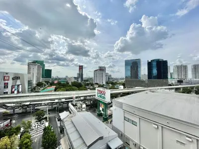 a view of a city with buildings and a freeway at 1 bedroom Life Ladprao in Bangkok