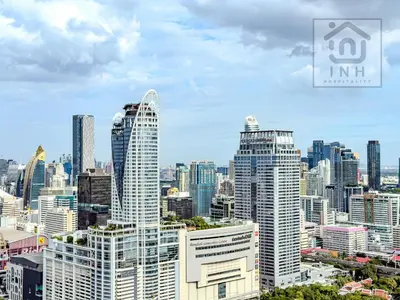 a view of a city skyline with tall buildings at Bangkok High-Floor Luxury Suite 2 Bedrooms 2 Bathrooms King & Queen Bed Sky Pool Heart of Siam District 曼谷高层奢华套房 两卧两卫 特大床 大床 无边泳池 坐落暹罗商圈核心 in Bangkok