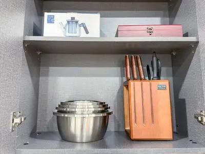 a kitchen shelf with a pot and utensils at Bangkok High-Floor Luxury Suite 2 Bedrooms 2 Bathrooms King & Queen Bed Sky Pool Heart of Siam District 曼谷高层奢华套房 两卧两卫 特大床 大床 无边泳池 坐落暹罗商圈核心 in Bangkok