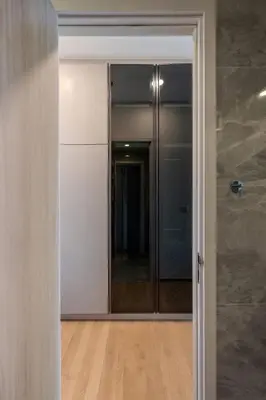 an open door to a room with a walk in shower at New City Condo in Central Bangkok in Pratunam