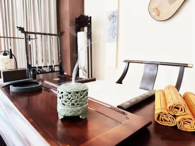 a wooden table with a vase on top of it at Chinatown No9 Boutique Hotel in Bangkok