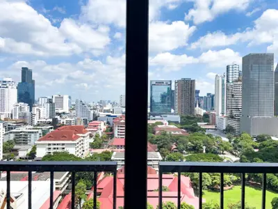 a view of a city from a balcony at Near BTS l Large 50 sqm l Luxury facilities l Rooftop Pool in Bangkok