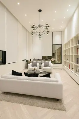 a living room with a white couch and a table at Incredible Loft with High Ceiling in Bangkok