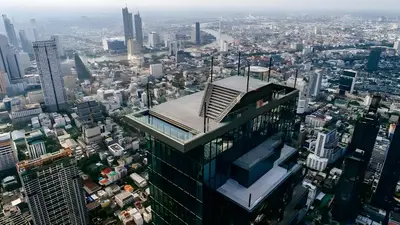 a view of a city from the top of a skyscraper at XX GO INN Silom - BTS Surasak in Yan Nawa